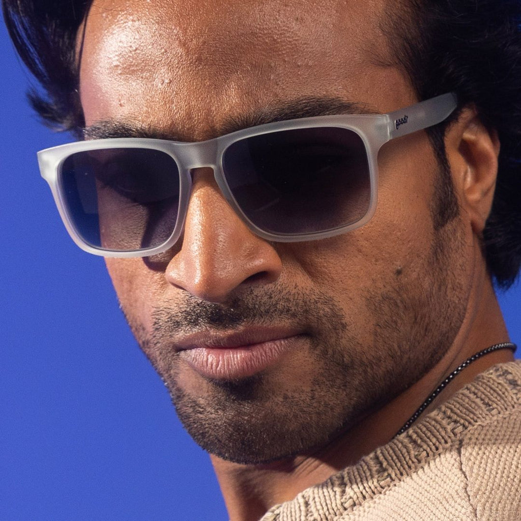 Luxury gray-framed polarized sunglasses on a professional man, showcasing elegant style accessories. - "Casually Juggles Boulders" Grand G Polarized Sunglasses - Default Title - Rare Air Discs, Shopify Collective