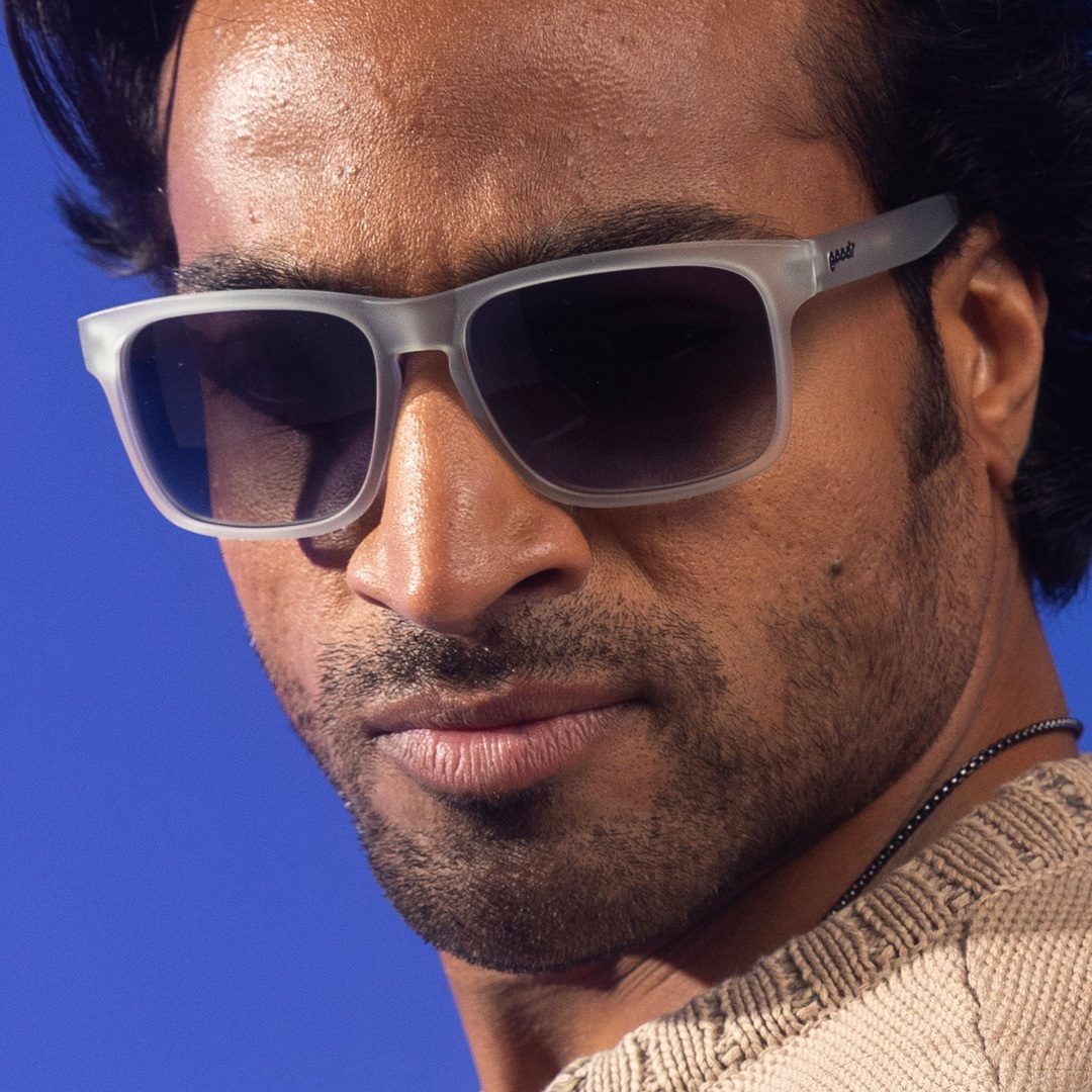 Luxury gray-framed polarized sunglasses on a professional man, showcasing elegant style accessories. - "Casually Juggles Boulders" Grand G Polarized Sunglasses - Default Title - Rare Air Discs, Shopify Collective