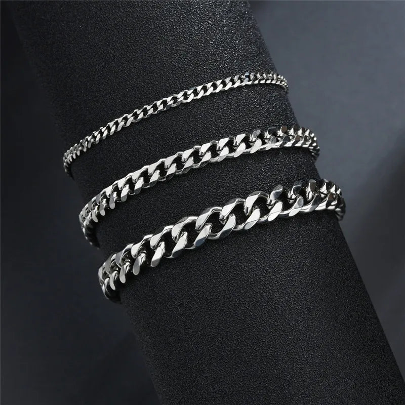 Set of three silver stainless steel curb Cuban chain bracelets in different widths, perfect luxury accessories for elegant,. - LETAPI Fashion Stainless Steel Curb Cuban Chain Bracelet for Men Women Hip Hop Couple Unisex Wrist Hand Jewelry Gift Party - Black Color / 22cm / Width 7mm - from-ae-fiidom