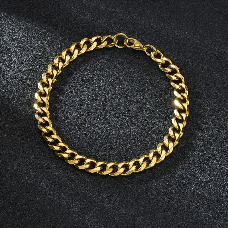 Gold stainless steel curb Cuban chain bracelet with a polished finish, luxury accessory for elegant, professional style. - LETAPI Fashion Stainless Steel Curb Cuban Chain Bracelet for Men Women Hip Hop Couple Unisex Wrist Hand Jewelry Gift Party - Black Color / 22cm / Width 7mm - from-ae-fiidom
