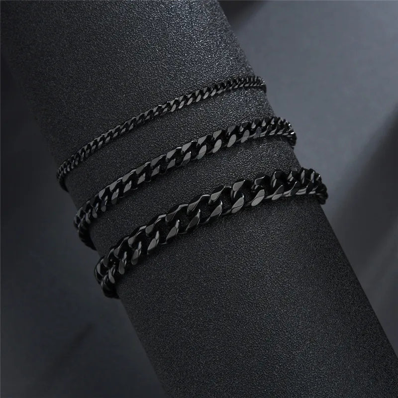 Set of three black stainless steel curb Cuban chain bracelets in varying widths, sleek luxury accessories for elegant. - LETAPI Fashion Stainless Steel Curb Cuban Chain Bracelet for Men Women Hip Hop Couple Unisex Wrist Hand Jewelry Gift Party - Black Color / 22cm / Width 7mm - from-ae-fiidom